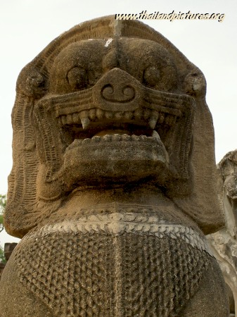 The head of a stone made lion statue in wat isaan region